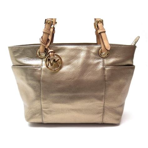 sac a main doré michael kors|Michael Kors opened satchel purse.